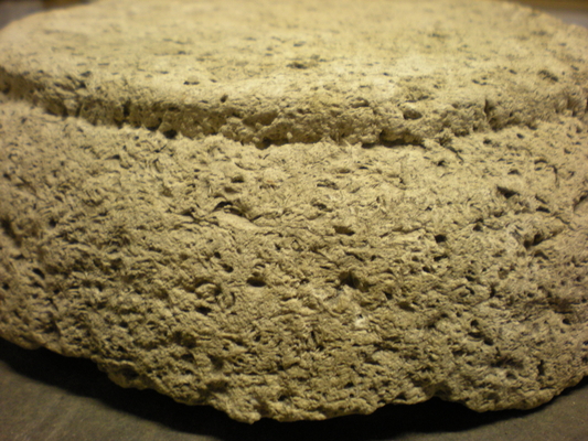 (Bottom of mortar showing erosion)